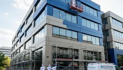 Professional commercial painters working on an office building exterior in Chicago, IL